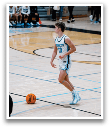 A basketball player wearing a blue and white uniform is walking on a basketball court. AI generated content