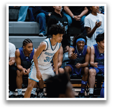 Basketball players on the court, one of them wearing a white jersey with the number 3. AI generated content