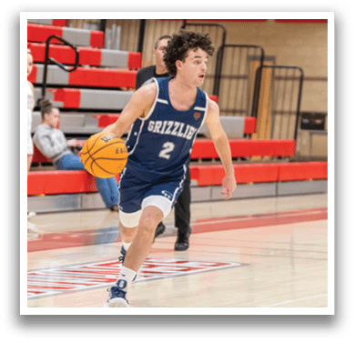 A man wearing a blue and white basketball uniform is holding a basketball. AI generated content