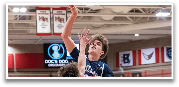 Two basketball players are fighting for a rebound. AI generated content