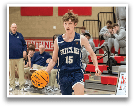 A basketball player wearing a blue uniform with the number 15 on the back is running with a basketball. AI generated content
