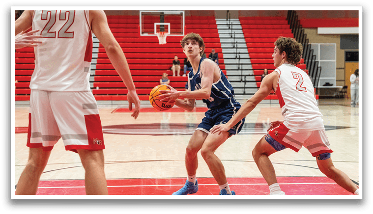 A group of young men playing basketball on a court. AI generated content