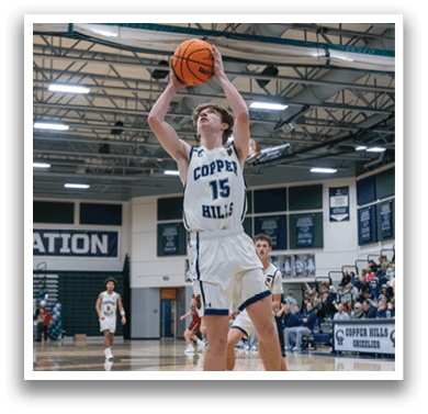 A basketball player in a white uniform jumps up to catch a basketball. AI generated content