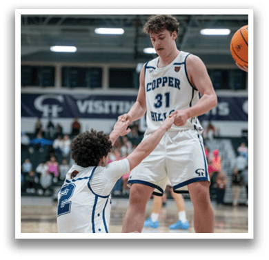 Two men are on the basketball court, one kneeling and the other standing. The standing man is wearing a basketball jersey with the number 31 on it. AI generated content