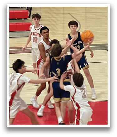 A group of young men playing basketball on a court. AI generated content