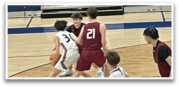 A group of young men playing basketball on a court. AI generated content