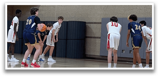 A group of young men playing basketball on a court. AI generated content