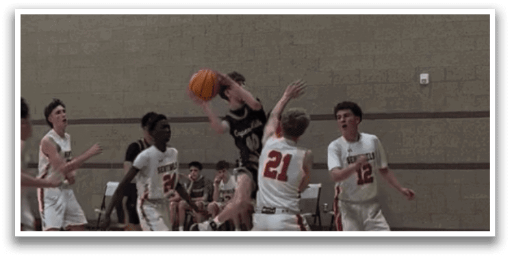 A group of people playing basketball on a court. AI generated content