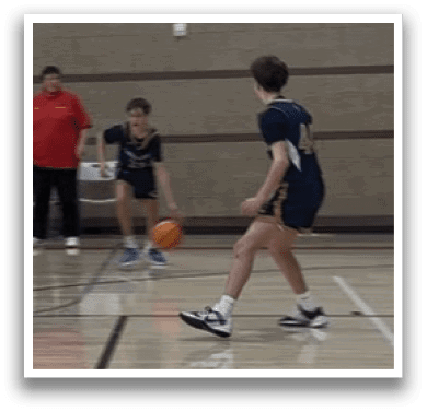 A group of young men playing basketball in a gym. AI generated content