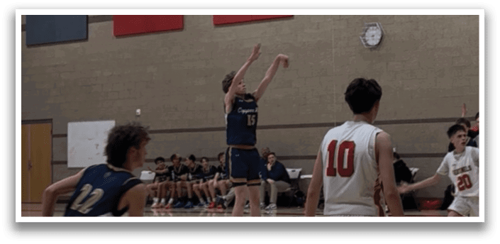 A group of people playing basketball in a gym. AI generated content