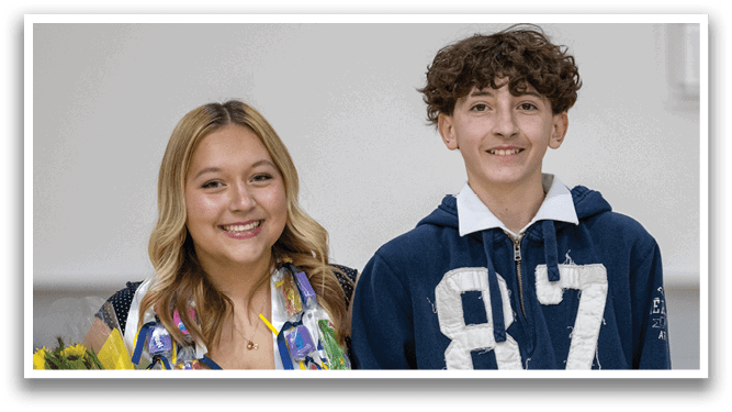 A man and woman are standing next to a young man wearing a necklace and a blue shirt. The young man is holding a basketball. AI generated content