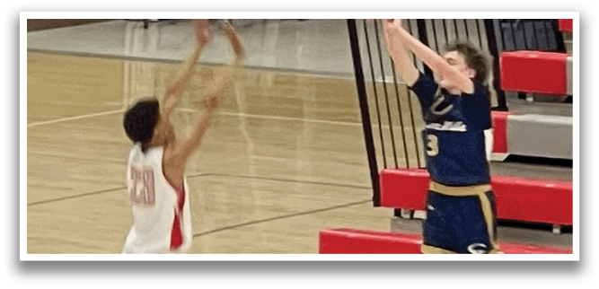 Three boys playing basketball on a court. One boy is jumping to shoot the ball. AI generated content