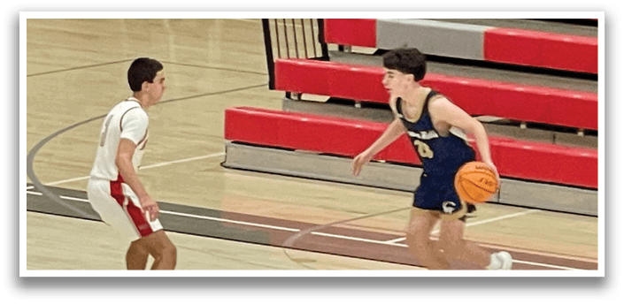 Two boys playing basketball on a court. AI generated content