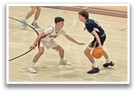 Two boys playing basketball on a court. One boy is holding a basketball while the other is trying to block him. AI generated content