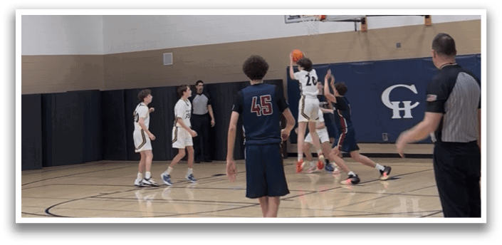 A group of young men playing basketball on a court. AI generated content