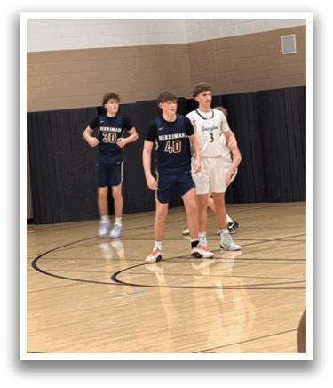 Three boys are playing basketball on a court. AI generated content
