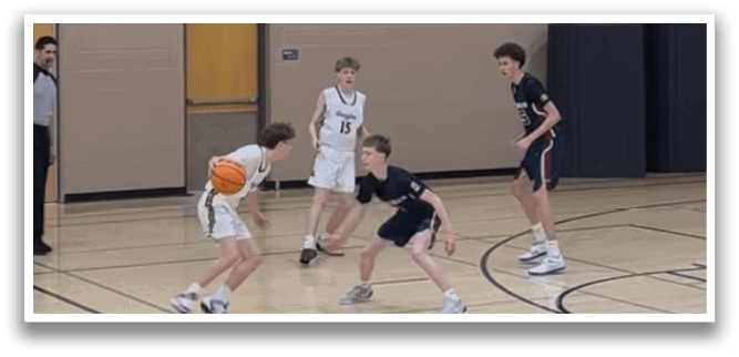A group of young men playing basketball on a court. AI generated content
