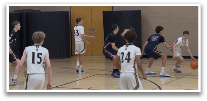 A group of young men playing basketball on a court. AI generated content