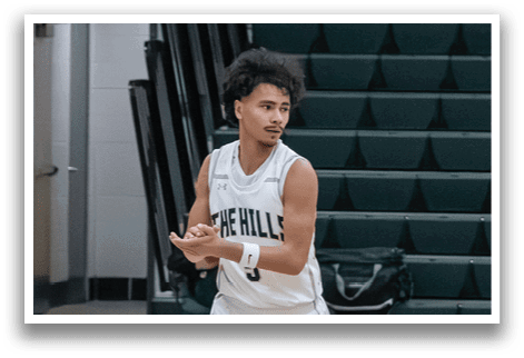 A basketball player wearing a white uniform is walking on a basketball court. AI generated content