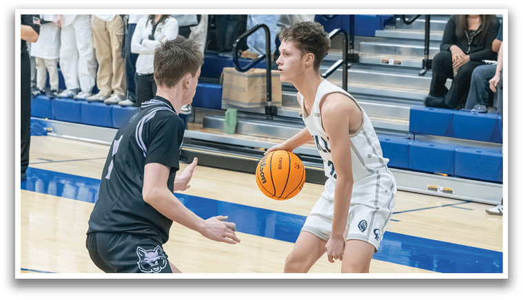 Two basketball players on a court, one holding the ball and the other trying to get it. AI generated content