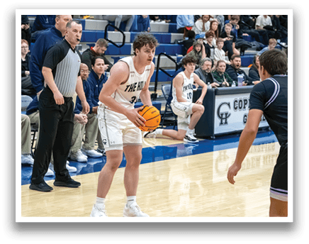 Basketball players on a court, one holding a ball, with a crowd watching. AI generated content