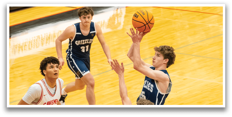 A basketball player in a blue uniform is reaching for the ball while two other players from the opposing team watch. AI generated content