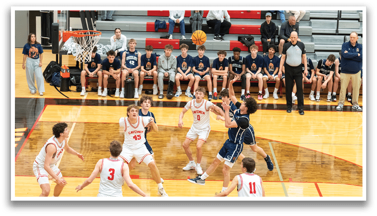 A group of young men playing basketball on a court. AI generated content