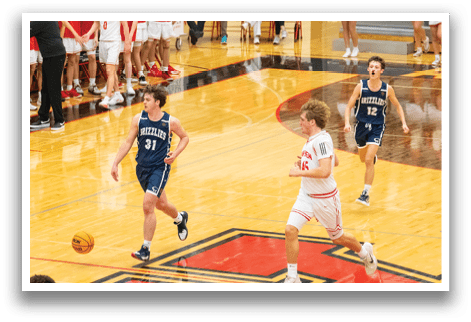 A group of people playing basketball on a court. AI generated content