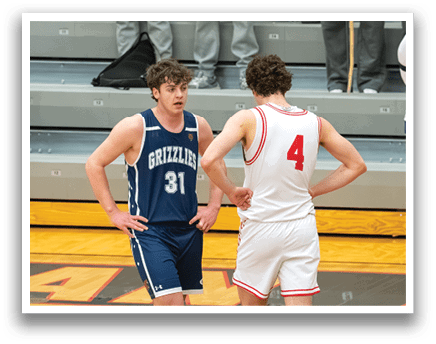 Two men wearing uniforms are standing on a basketball court, talking to each other. AI generated content