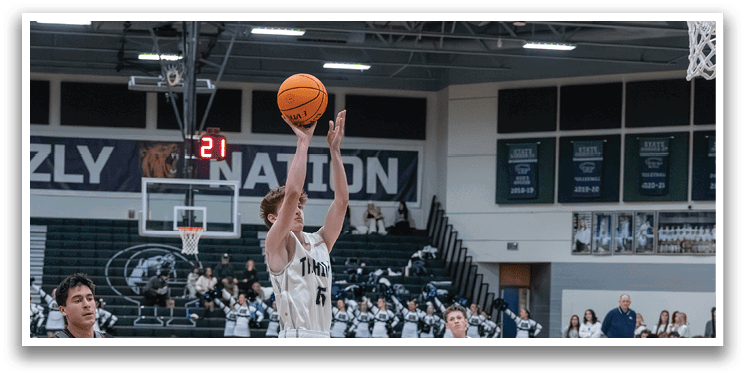 A basketball player leaps in the air to dunk the ball. AI generated content