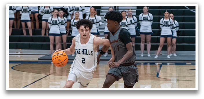 Two basketball players from opposing teams are running for the ball. AI generated content