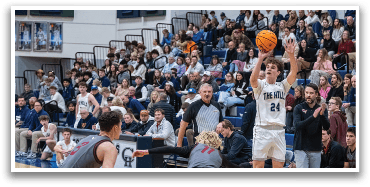 A basketball player is holding the ball while two other players try to block him. AI generated content