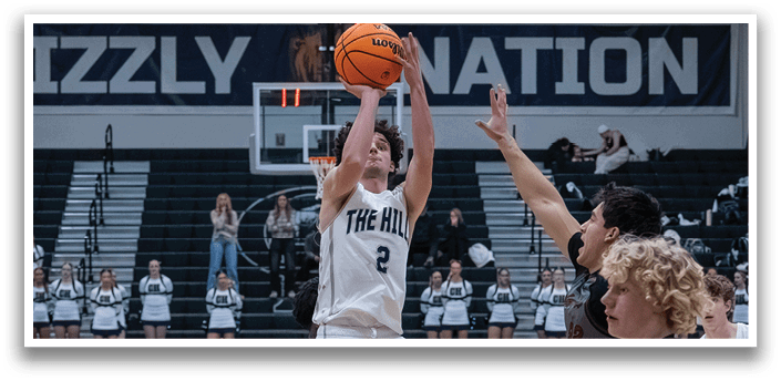 Basketball players on a court, one player is jumping to shoot the ball. AI generated content