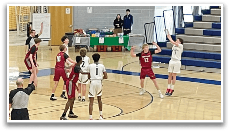 A group of people are playing basketball in a gym. AI generated content