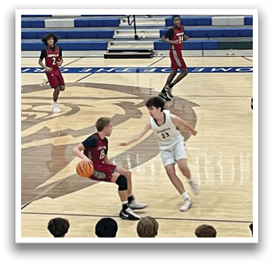A group of people playing basketball on a court. AI generated content