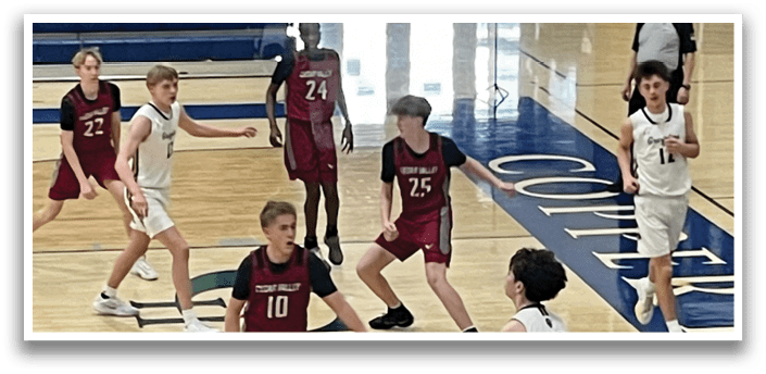 A group of young men playing basketball on a court. AI generated content