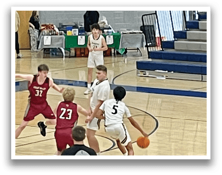 A group of people playing basketball on a court. AI generated content