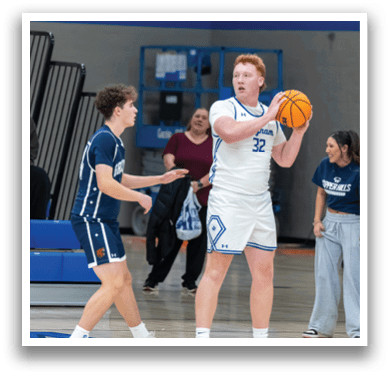 A basketball player in a white uniform holds a basketball while two other players watch. AI generated content
