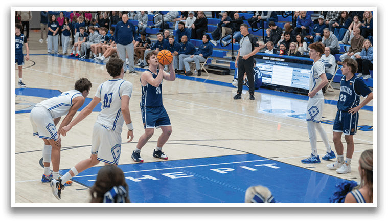 A group of people playing basketball on a court. AI generated content