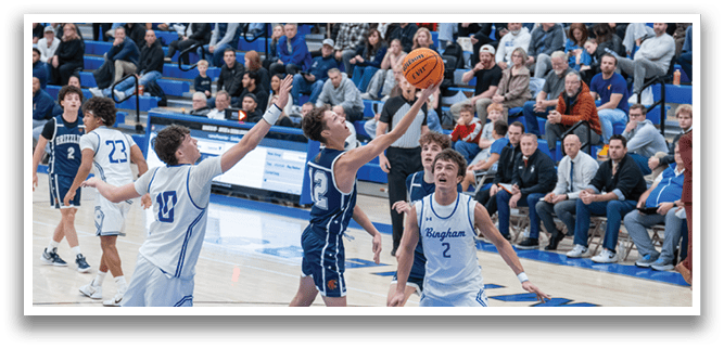 A group of people playing basketball, with one man jumping up to grab the ball. AI generated content
