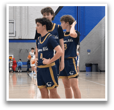 Three basketball players wearing blue uniforms stand on the court. AI generated content