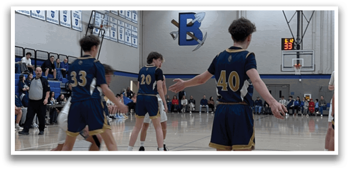 A group of young men playing basketball on a court. AI generated content