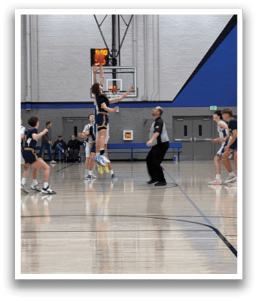 A group of people playing basketball on a court. AI generated content