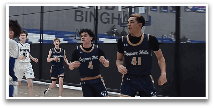 A group of young men playing basketball on a court. AI generated content