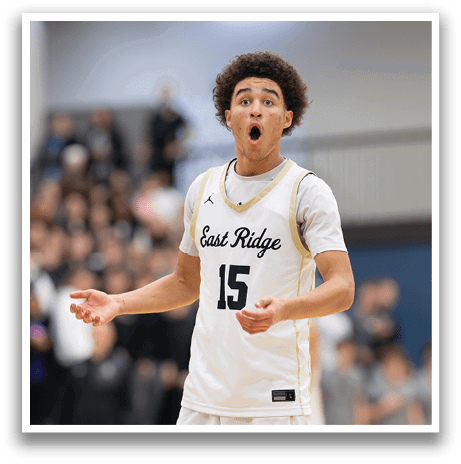 A man wearing a white jersey with the number 15 stands on a basketball court. AI generated content