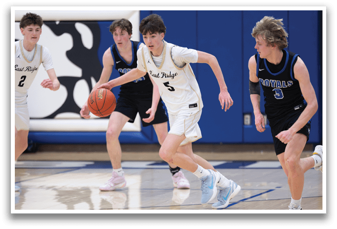 Four boys playing basketball, one holding a basketball, another with a basketball in his hand, and two others running. AI generated content