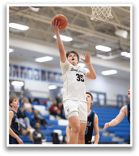 A basketball player jumps in the air to catch the ball. AI generated content