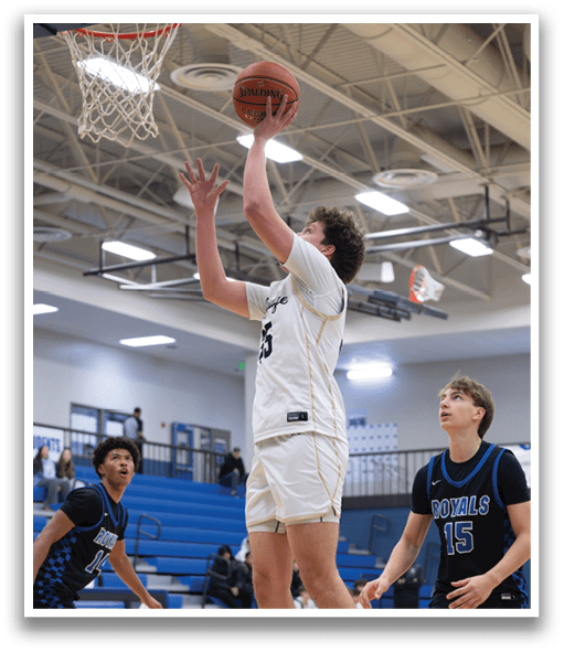 A basketball player leaps into the air to grab the ball. AI generated content