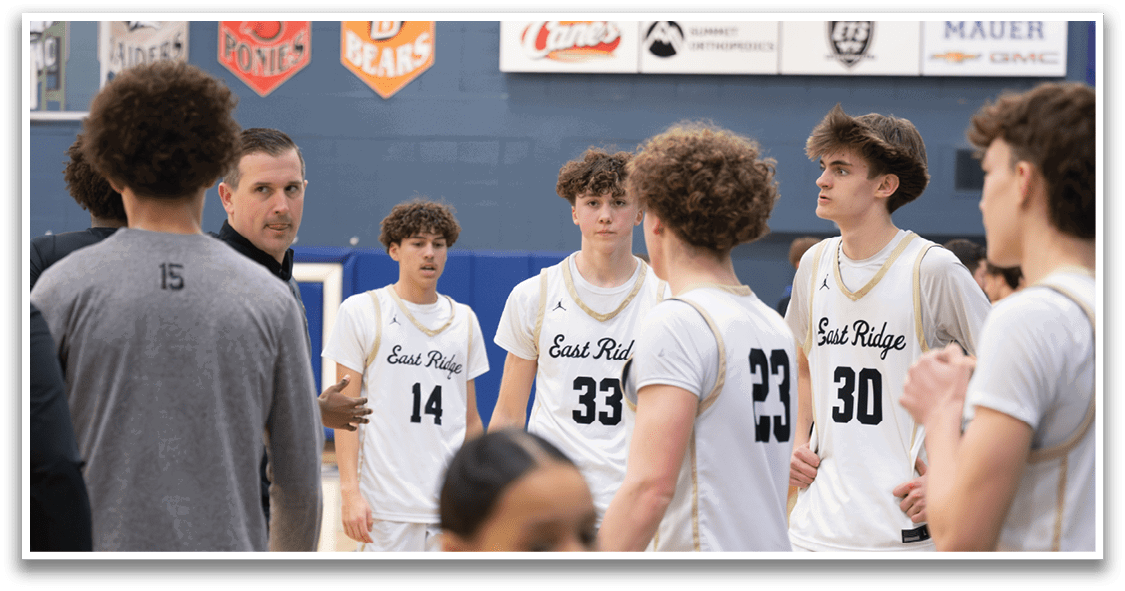 A group of young men wearing East Ridge jerseys stand on a basketball court. AI generated content