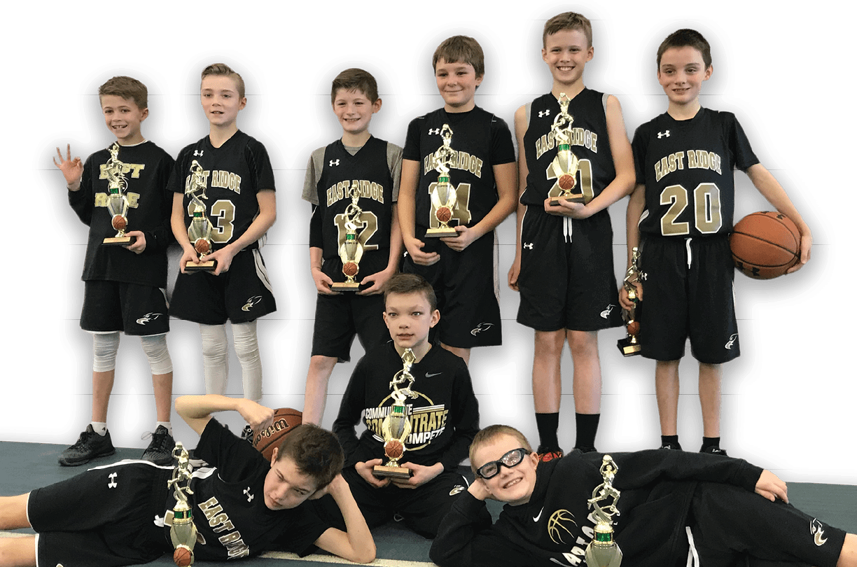 A group of young boys pose for a picture with trophies in their hands. AI generated content